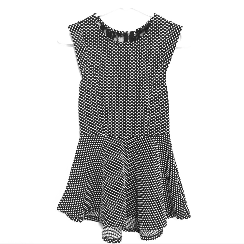 Black and White Peplum Top with lace back